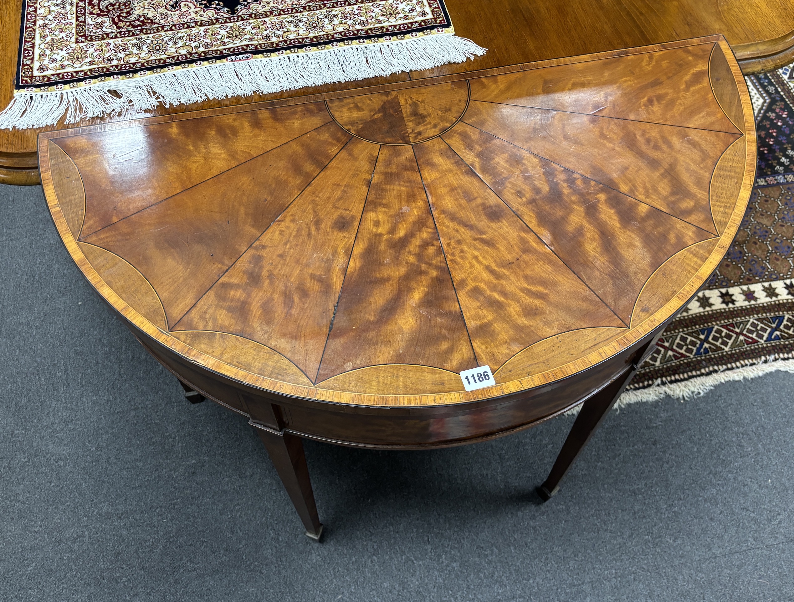 A George III satinwood D shape folding card table, width 92cm, depth 46cm, height 77cm